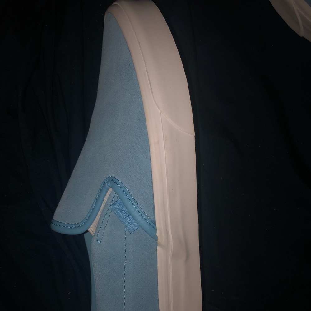 Baby blue slip on vans